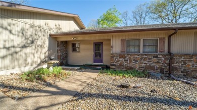 Nestled in the heart of Bella Vista, this charming townhouse on Bella Vista Country Club - Berksdale in Arkansas - for sale on GolfHomes.com, golf home, golf lot