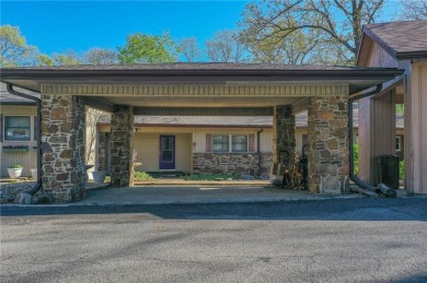 Nestled in the heart of Bella Vista, this charming townhouse on Bella Vista Country Club - Berksdale in Arkansas - for sale on GolfHomes.com, golf home, golf lot