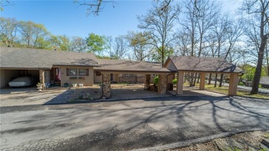 Nestled in the heart of Bella Vista, this charming townhouse on Bella Vista Country Club - Berksdale in Arkansas - for sale on GolfHomes.com, golf home, golf lot