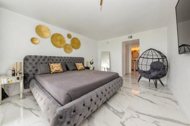 Renovated to perfection, this chic condominium in Lakeshore Club on The President Country Club in Florida - for sale on GolfHomes.com, golf home, golf lot