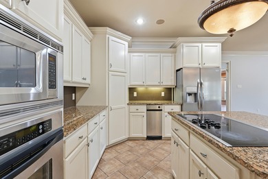 Experience stunning golf course views from this beautiful home on Centennial Valley Golf Course in Arkansas - for sale on GolfHomes.com, golf home, golf lot