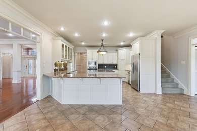 Experience stunning golf course views from this beautiful home on Centennial Valley Golf Course in Arkansas - for sale on GolfHomes.com, golf home, golf lot