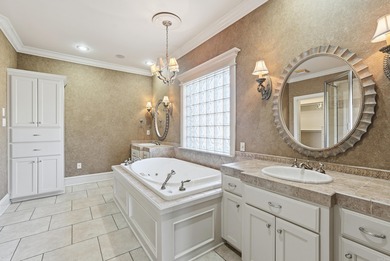 Experience stunning golf course views from this beautiful home on Centennial Valley Golf Course in Arkansas - for sale on GolfHomes.com, golf home, golf lot