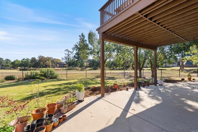Experience stunning golf course views from this beautiful home on Centennial Valley Golf Course in Arkansas - for sale on GolfHomes.com, golf home, golf lot