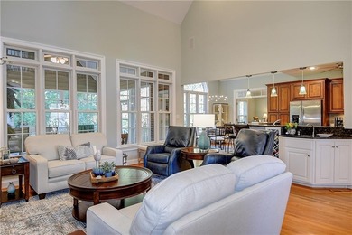 Discover effortless elegance in this custom brick home nestled on Riverfront Golf Club in Virginia - for sale on GolfHomes.com, golf home, golf lot