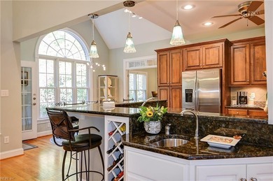 Discover effortless elegance in this custom brick home nestled on Riverfront Golf Club in Virginia - for sale on GolfHomes.com, golf home, golf lot