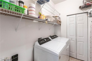Immaculate TOP floor end unit sold FURNISHED w/ a Golf on Legends Golf and Country Club in Florida - for sale on GolfHomes.com, golf home, golf lot