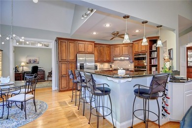 Discover effortless elegance in this custom brick home nestled on Riverfront Golf Club in Virginia - for sale on GolfHomes.com, golf home, golf lot