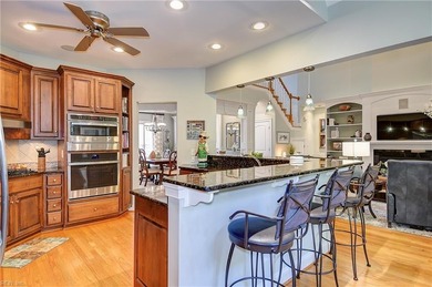 Discover effortless elegance in this custom brick home nestled on Riverfront Golf Club in Virginia - for sale on GolfHomes.com, golf home, golf lot