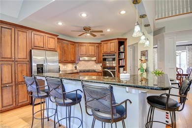 Discover effortless elegance in this custom brick home nestled on Riverfront Golf Club in Virginia - for sale on GolfHomes.com, golf home, golf lot