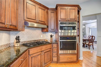 Discover effortless elegance in this custom brick home nestled on Riverfront Golf Club in Virginia - for sale on GolfHomes.com, golf home, golf lot