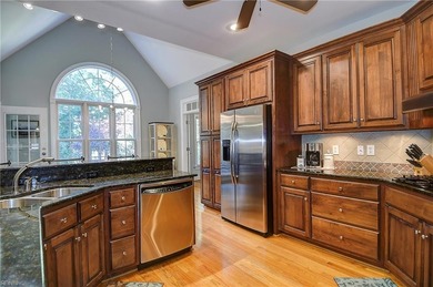 Discover effortless elegance in this custom brick home nestled on Riverfront Golf Club in Virginia - for sale on GolfHomes.com, golf home, golf lot