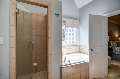 Discover effortless elegance in this custom brick home nestled on Riverfront Golf Club in Virginia - for sale on GolfHomes.com, golf home, golf lot