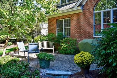 Discover effortless elegance in this custom brick home nestled on Riverfront Golf Club in Virginia - for sale on GolfHomes.com, golf home, golf lot