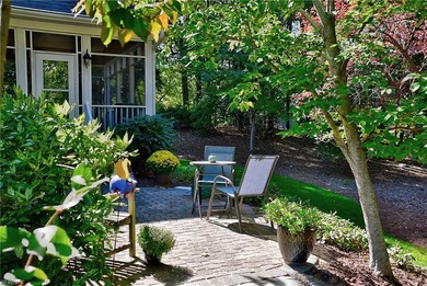 Discover effortless elegance in this custom brick home nestled on Riverfront Golf Club in Virginia - for sale on GolfHomes.com, golf home, golf lot