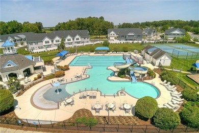 Discover effortless elegance in this custom brick home nestled on Riverfront Golf Club in Virginia - for sale on GolfHomes.com, golf home, golf lot