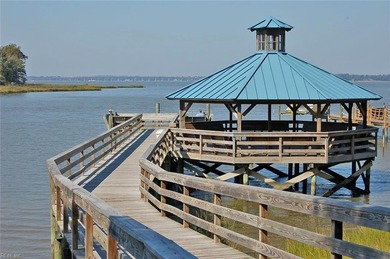 Discover effortless elegance in this custom brick home nestled on Riverfront Golf Club in Virginia - for sale on GolfHomes.com, golf home, golf lot