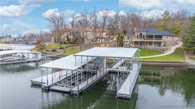 Discover the ultimate lakefront lifestyle in this stunning home on The Club At Porto Cima in Missouri - for sale on GolfHomes.com, golf home, golf lot