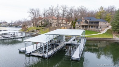 Discover the ultimate lakefront lifestyle in this stunning home on The Club At Porto Cima in Missouri - for sale on GolfHomes.com, golf home, golf lot