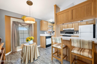 CHARMING 2 BEDROOM 2 BATH HOME ,OFFICE, FORMAL DINING ROOM on Quail Wood Greens Golf Course in Arizona - for sale on GolfHomes.com, golf home, golf lot