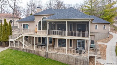 Discover the ultimate lakefront lifestyle in this stunning home on The Club At Porto Cima in Missouri - for sale on GolfHomes.com, golf home, golf lot