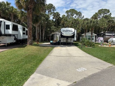 Nicely shaded Oak Cove Road RV property, including a storage on The Great Outdoors Golf and Country Club in Florida - for sale on GolfHomes.com, golf home, golf lot