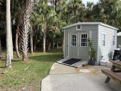 Nicely shaded Oak Cove Road RV property, including a storage on The Great Outdoors Golf and Country Club in Florida - for sale on GolfHomes.com, golf home, golf lot