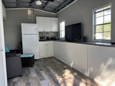 Nicely shaded Oak Cove Road RV property, including a storage on The Great Outdoors Golf and Country Club in Florida - for sale on GolfHomes.com, golf home, golf lot
