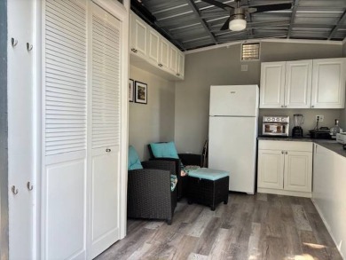 Nicely shaded Oak Cove Road RV property, including a storage on The Great Outdoors Golf and Country Club in Florida - for sale on GolfHomes.com, golf home, golf lot