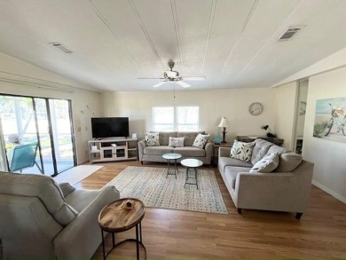 Beautifully maintained open-concept 2-bd/2-ba home is situated on Del Tura Golf and Country Club in Florida - for sale on GolfHomes.com, golf home, golf lot