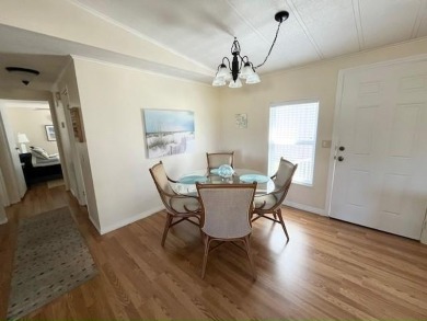 Beautifully maintained open-concept 2-bd/2-ba home is situated on Del Tura Golf and Country Club in Florida - for sale on GolfHomes.com, golf home, golf lot