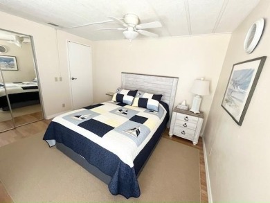 Beautifully maintained open-concept 2-bd/2-ba home is situated on Del Tura Golf and Country Club in Florida - for sale on GolfHomes.com, golf home, golf lot
