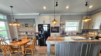 This 2020 farmhouse in Cypress Lakes Village offers 2 bedrooms on Big Cypress Golf and Country Club in Florida - for sale on GolfHomes.com, golf home, golf lot