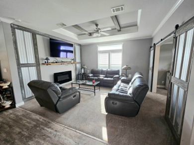 This 2020 farmhouse in Cypress Lakes Village offers 2 bedrooms on Big Cypress Golf and Country Club in Florida - for sale on GolfHomes.com, golf home, golf lot