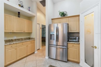 Located in the secure, private gated community of Sabal Trace on Sabal Trace Golf and Country Club in Florida - for sale on GolfHomes.com, golf home, golf lot