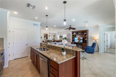 This beautiful Vernon Hills model overlooks the 2nd fairway and on Panther Run Golf Club in Florida - for sale on GolfHomes.com, golf home, golf lot