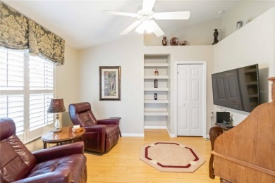 Located in the secure, private gated community of Sabal Trace on Sabal Trace Golf and Country Club in Florida - for sale on GolfHomes.com, golf home, golf lot