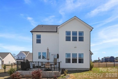 Beautifully maintained 3-bedroom, 2.5-bath home built in 2024 on Edgewater Golf Club in South Carolina - for sale on GolfHomes.com, golf home, golf lot