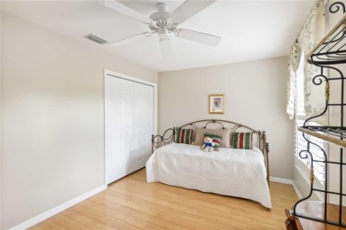 Located in the secure, private gated community of Sabal Trace on Sabal Trace Golf and Country Club in Florida - for sale on GolfHomes.com, golf home, golf lot