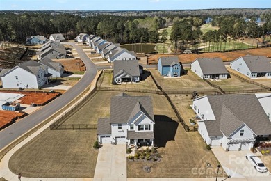Beautifully maintained 3-bedroom, 2.5-bath home built in 2024 on Edgewater Golf Club in South Carolina - for sale on GolfHomes.com, golf home, golf lot