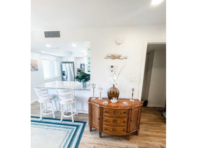 Beautifully updated 2 bedroom, 2 bath, 5th floor, furnished on Ocean Village Golf Course in Florida - for sale on GolfHomes.com, golf home, golf lot