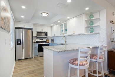 Beautifully updated 2 bedroom, 2 bath, 5th floor, furnished on Ocean Village Golf Course in Florida - for sale on GolfHomes.com, golf home, golf lot