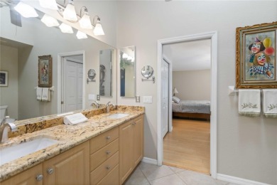 Located in the secure, private gated community of Sabal Trace on Sabal Trace Golf and Country Club in Florida - for sale on GolfHomes.com, golf home, golf lot