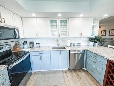 Beautifully updated 2 bedroom, 2 bath, 5th floor, furnished on Ocean Village Golf Course in Florida - for sale on GolfHomes.com, golf home, golf lot