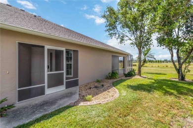 Located in the secure, private gated community of Sabal Trace on Sabal Trace Golf and Country Club in Florida - for sale on GolfHomes.com, golf home, golf lot