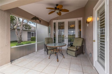 Located in the secure, private gated community of Sabal Trace on Sabal Trace Golf and Country Club in Florida - for sale on GolfHomes.com, golf home, golf lot