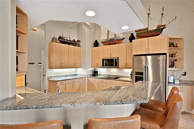 Experience the ultimate Florida waterfront lifestyle in this on Saint Andrews South Golf Club in Florida - for sale on GolfHomes.com, golf home, golf lot