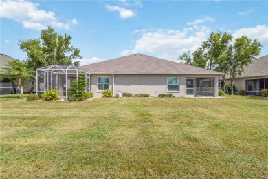 Located in the secure, private gated community of Sabal Trace on Sabal Trace Golf and Country Club in Florida - for sale on GolfHomes.com, golf home, golf lot