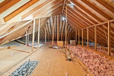 This all-brick ranch, 3-bedroom, 2-bathroom home has been on North Shore Country Club in North Carolina - for sale on GolfHomes.com, golf home, golf lot