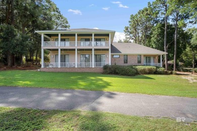 Check out this amazing, modern home nestled in this quiet cul de on Lake Forest Yacht and Country Club in Alabama - for sale on GolfHomes.com, golf home, golf lot